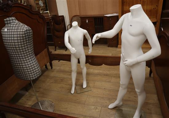 Two life-size child mannequins together with a tailors dummy largest 142cm high